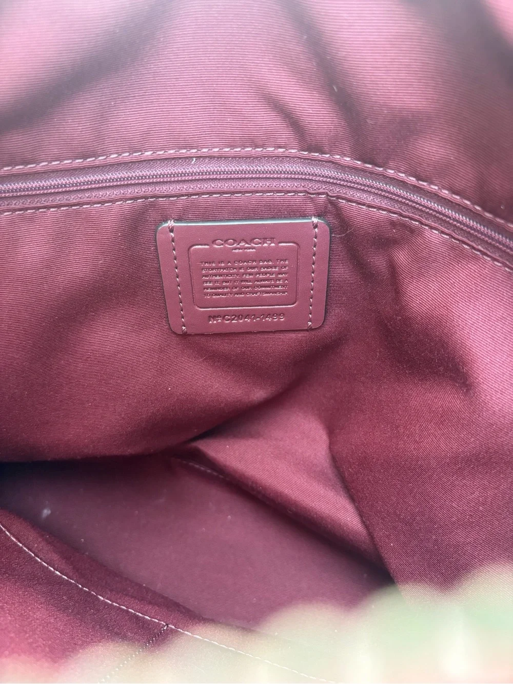 Coach red signature